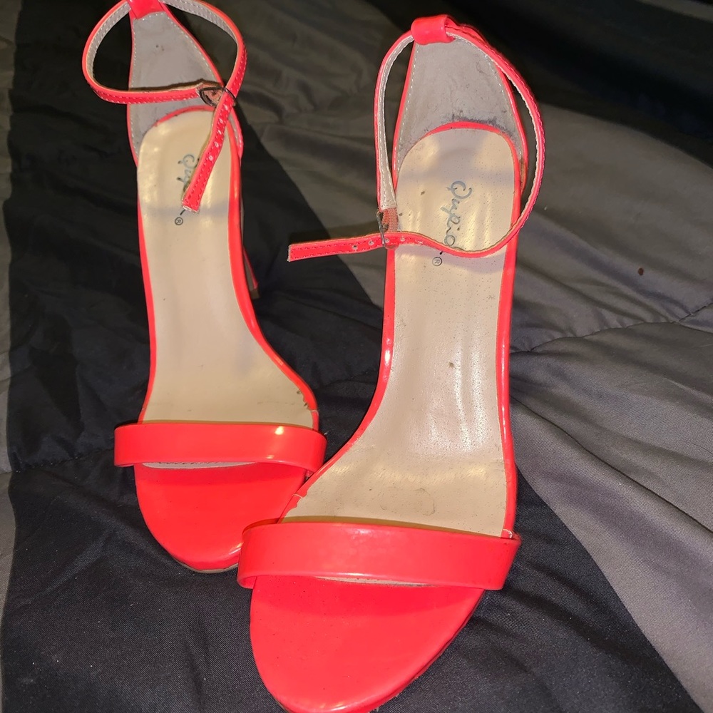 Bright orange heels